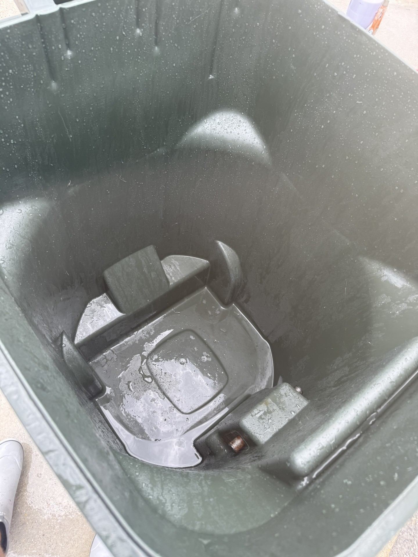 Trash can after hot-water sanitizing wash